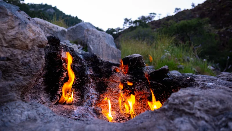 Natural flames burning from the rock at Yanartas, Mount Chimaera